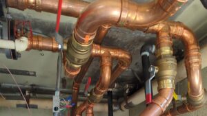 industrial building interiors with heating system pipes close up del city ok